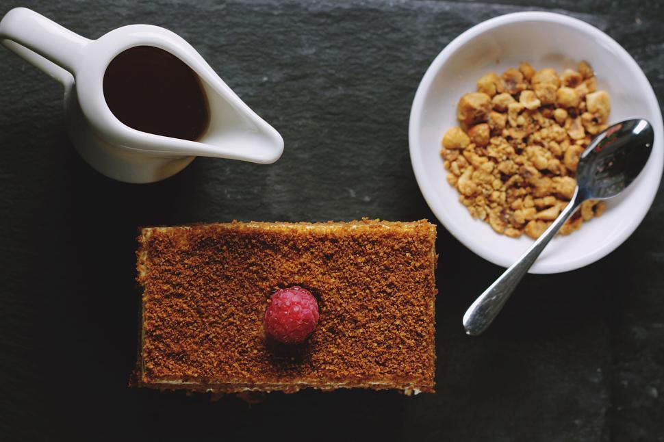 Free Image of Dessert with a raspberry and caramel sauce topping 