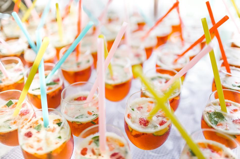 Free Image of Colorful cocktails with straws ready for a party. 