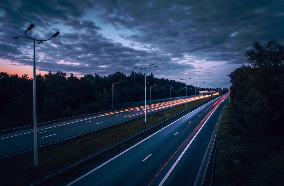 Free Image of Evening traffic on highway captured with long exposure 