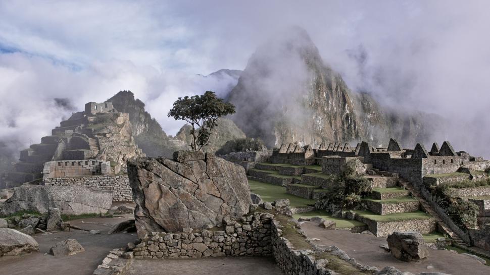 Free Image of Ancient Inca city of Machu Picchu shrouded in mist. 
