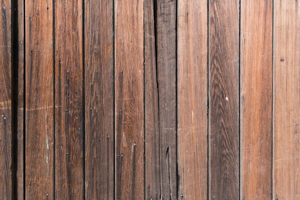 Free Image of Weathered wooden planks with varied shades of brown 