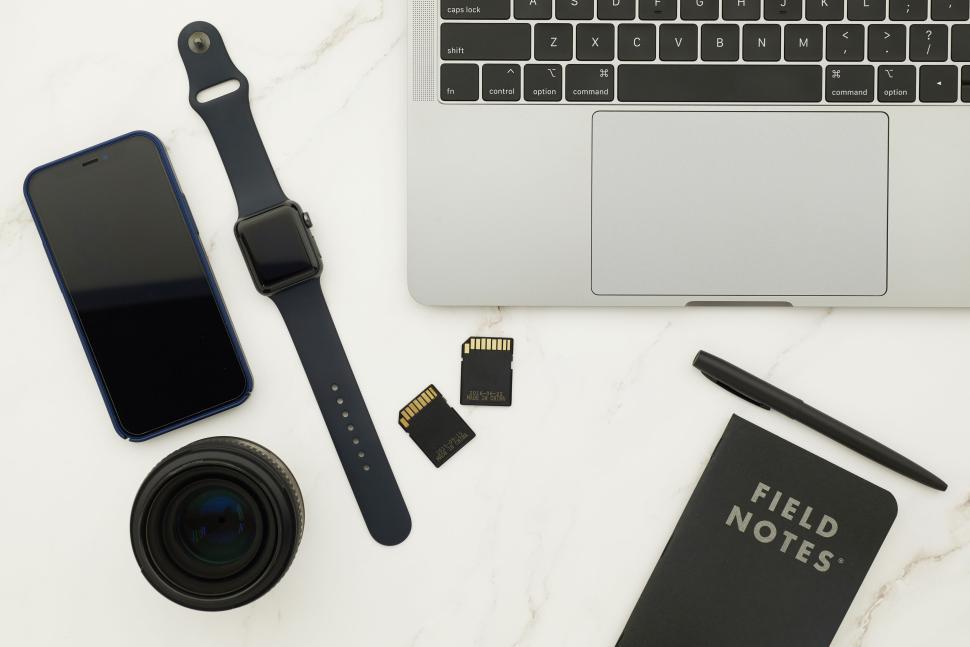 Free Image of Workspace essentials including laptop and tech gadgets 