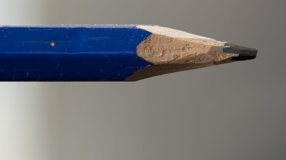 Free Image of Close-up of a sharpened blue pencil with coarse texture. 