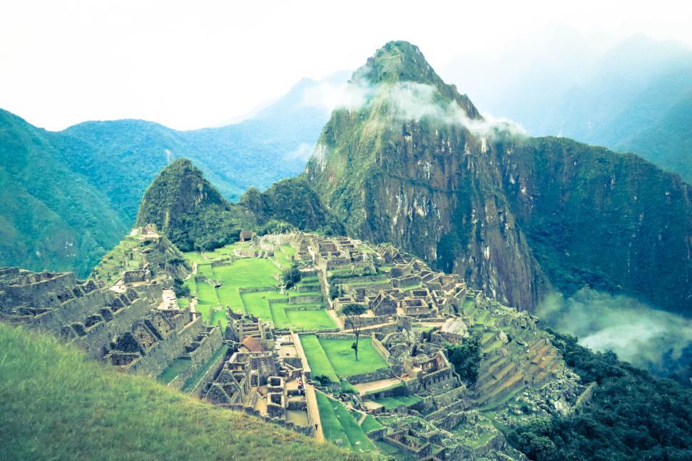 Free Image of Historic ancient ruins on mountain with lush greenery. 