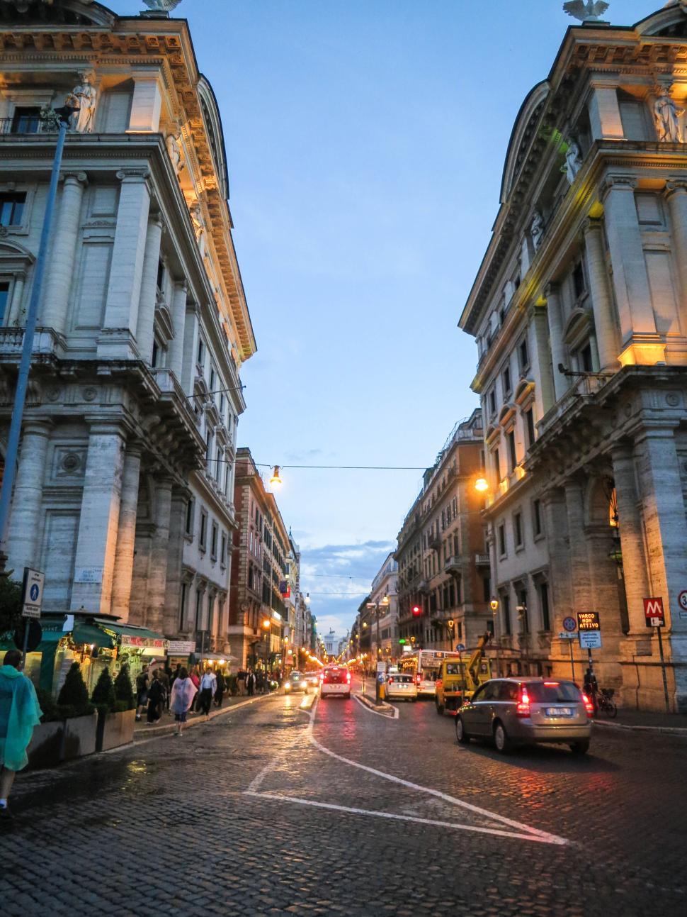 Free Image of Evening urban street view with lit historic buildings 