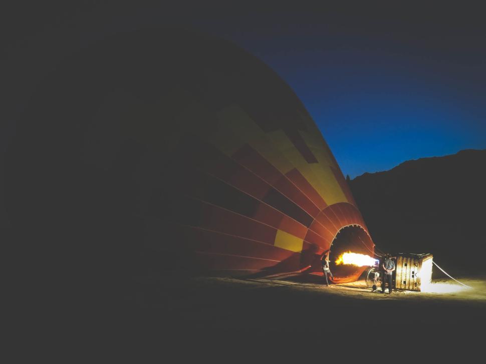 Free Image of Hot air balloon inflating during early morning twilight 