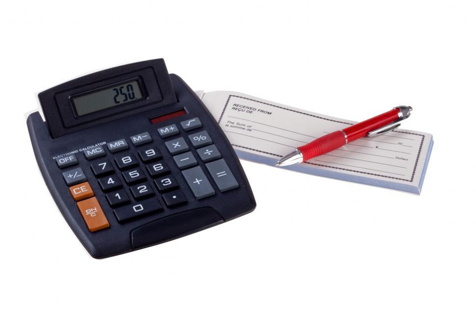 Free Image of Calculator and Receipt Book 