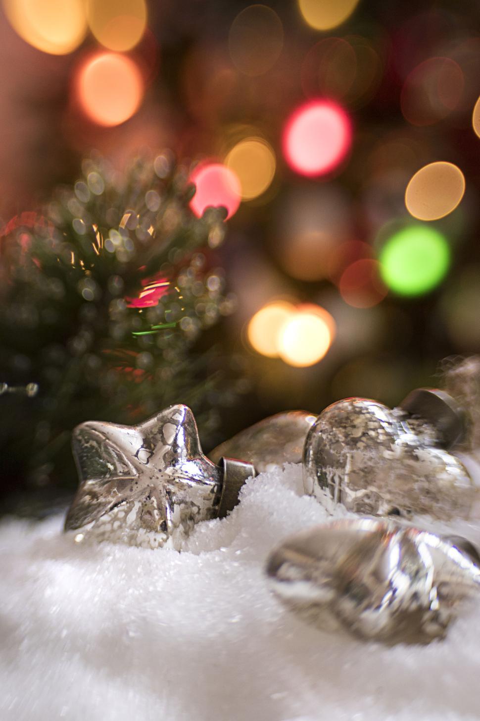 Free Image of Festive background with snow and star-shaped decorations 