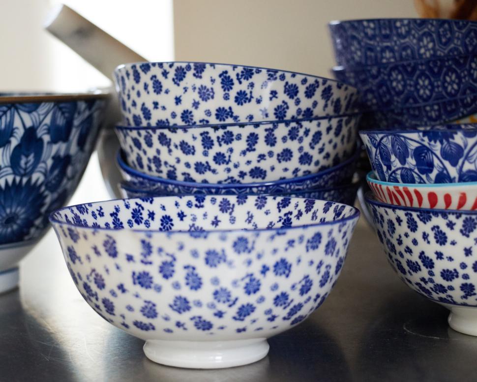 Free Image of Stack of blue floral patterned ceramic bowls 