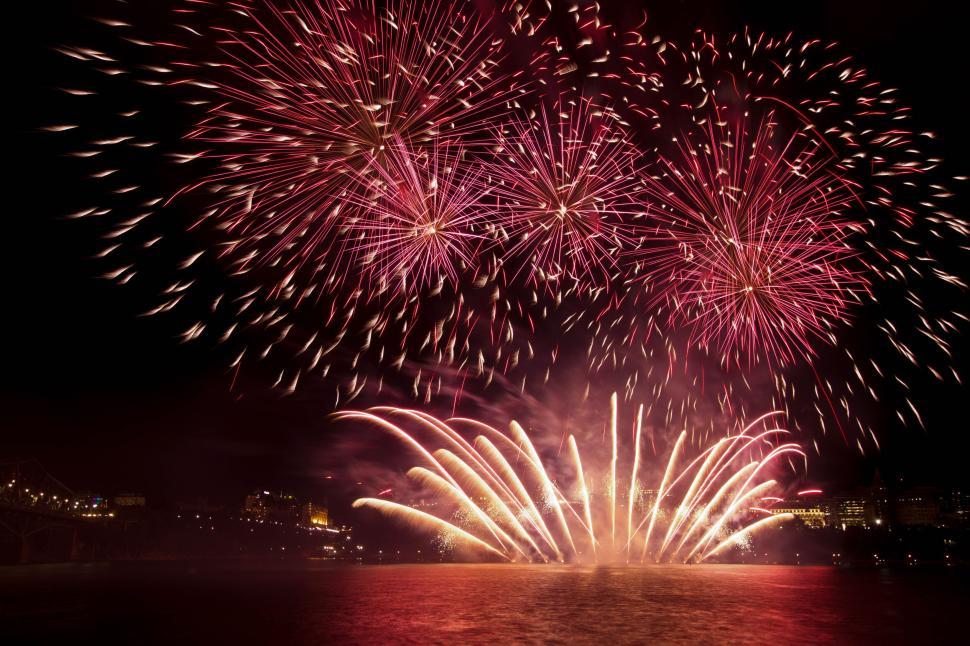 Free Image of Spectacular fireworks display lighting up the night sky 