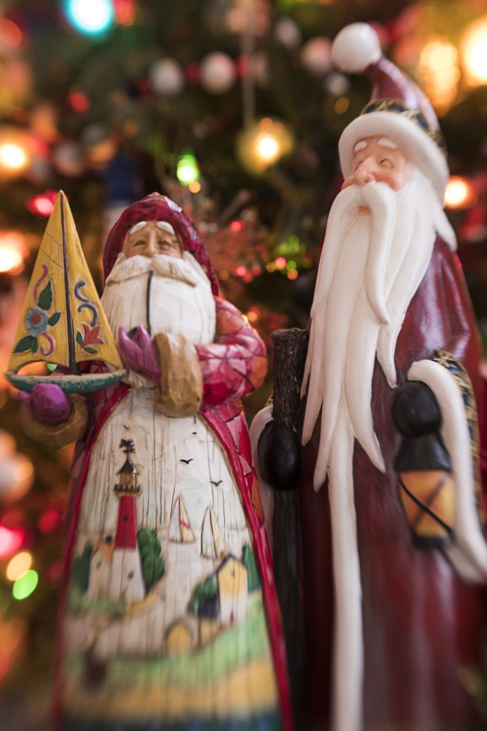 Free Image of Colorful Carved Figures in Holiday Themed Setting 