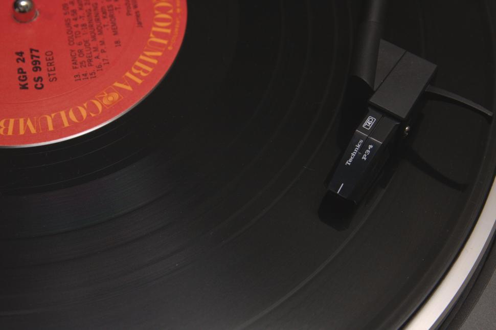 Free Image of Close-up of vintage vinyl record player needle arm. 