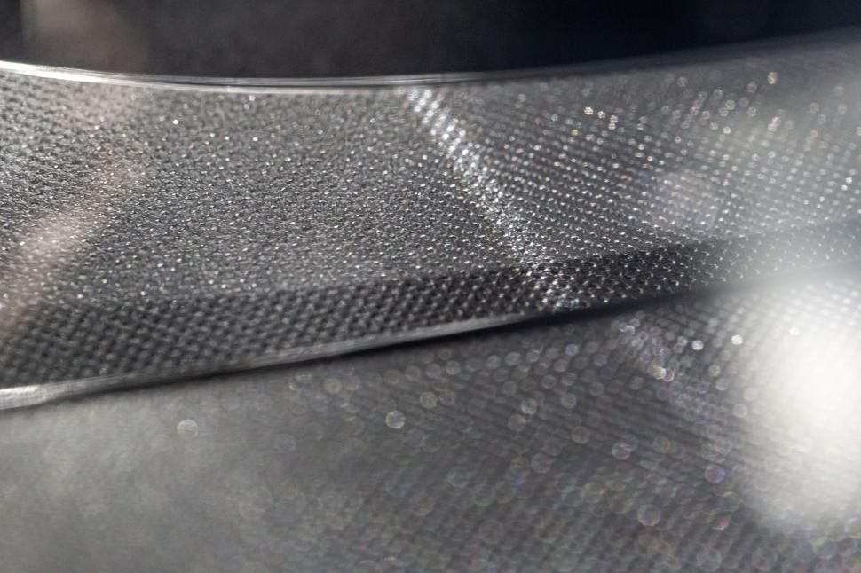 Free Image of Abstract textured close-up of a reflective surface 
