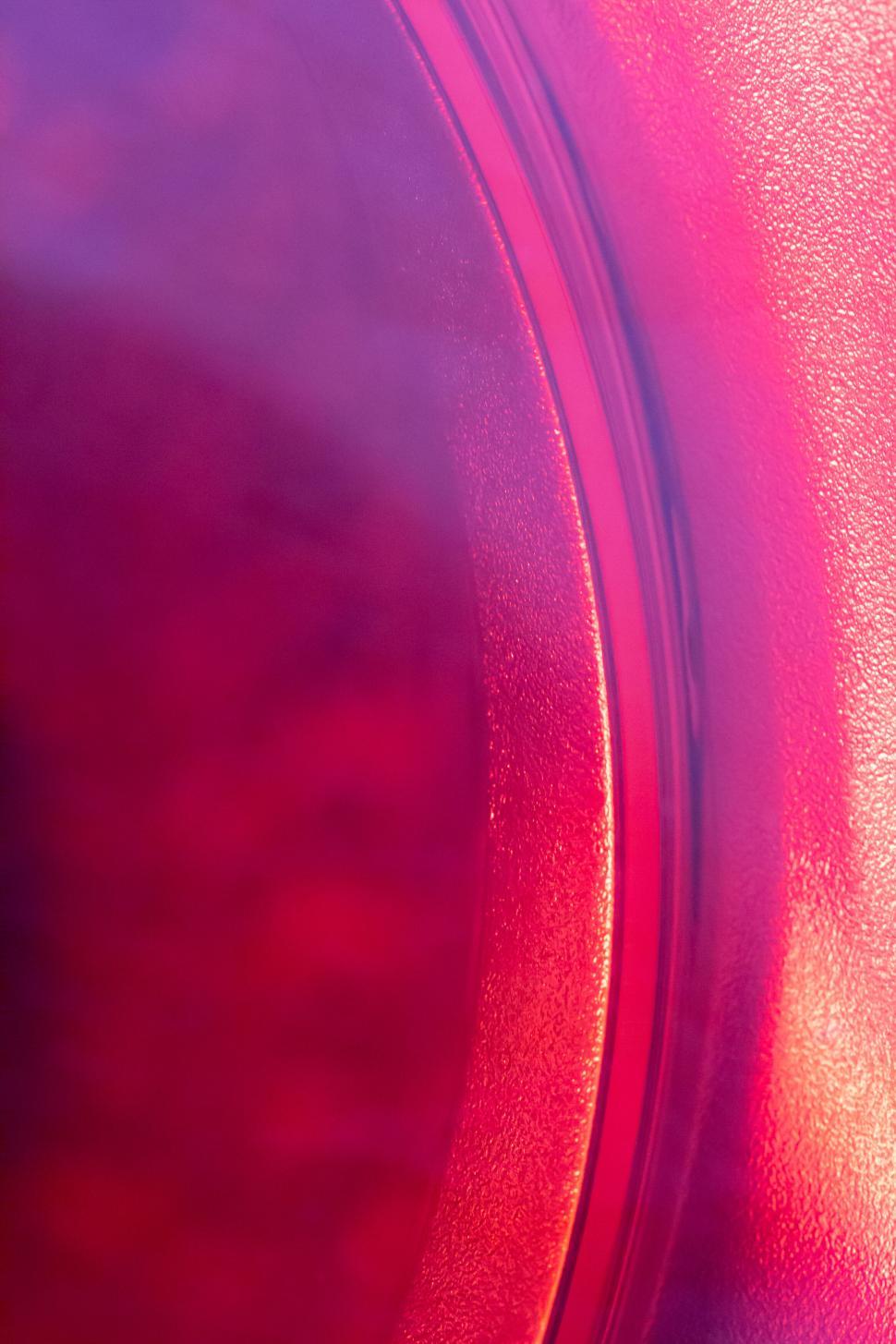 Free Image of Closeup of abstract red curved light reflection 