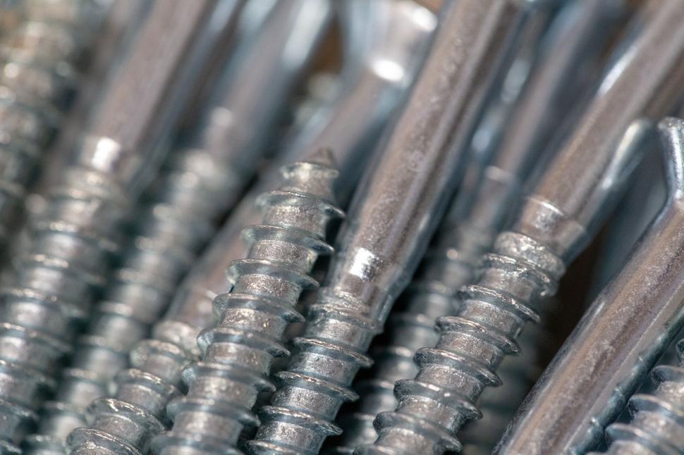 Free Image of Closeup of shiny metallic screws. 