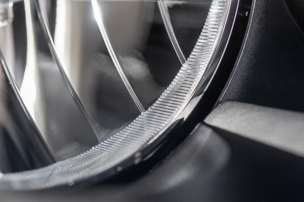 Free Image of Closeup of a headlight, detailed and intricate design. 