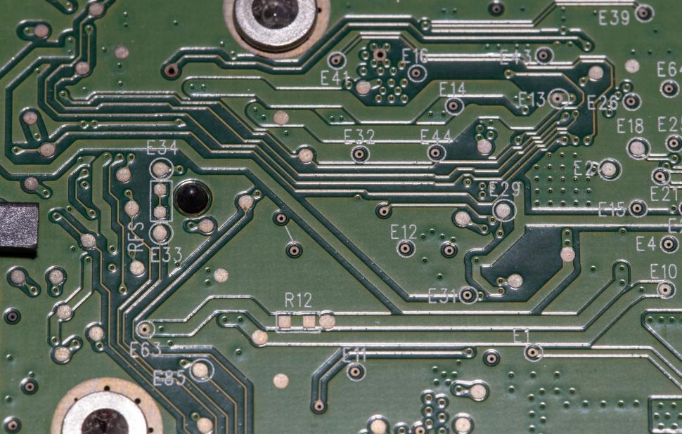 Free Image of Close-up of green circuit board electronic components 