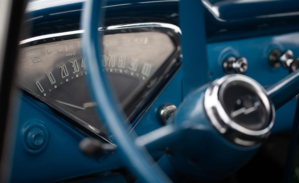 Free Image of Vintage car dashboard with speedometer and controls 
