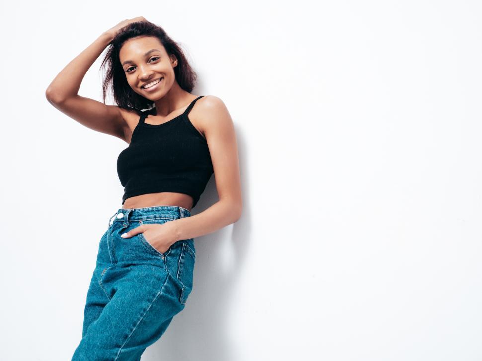 Free Image of Woman smiling, casual fashion, white background minimalism 