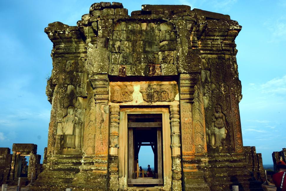 Free Image of Ancient stone temple entrance with intricate carvings 