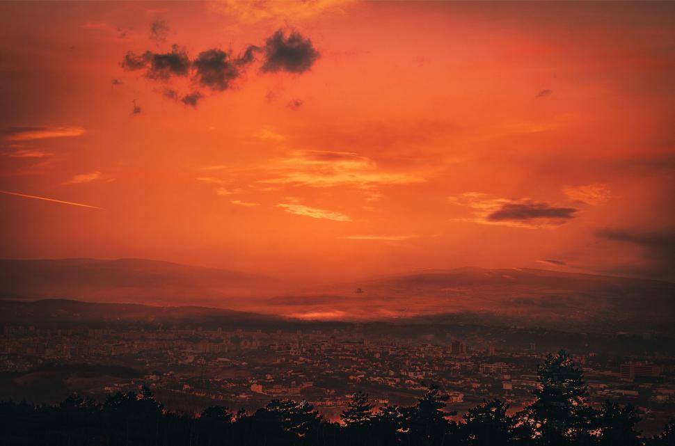 Free Image of Cityscape bathed in a warm sunset glow with unique colors 