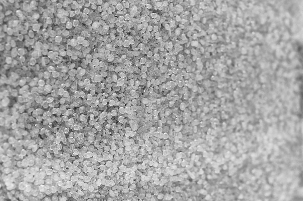 Free Image of Macro shot of gray polymer granules in high detail view 