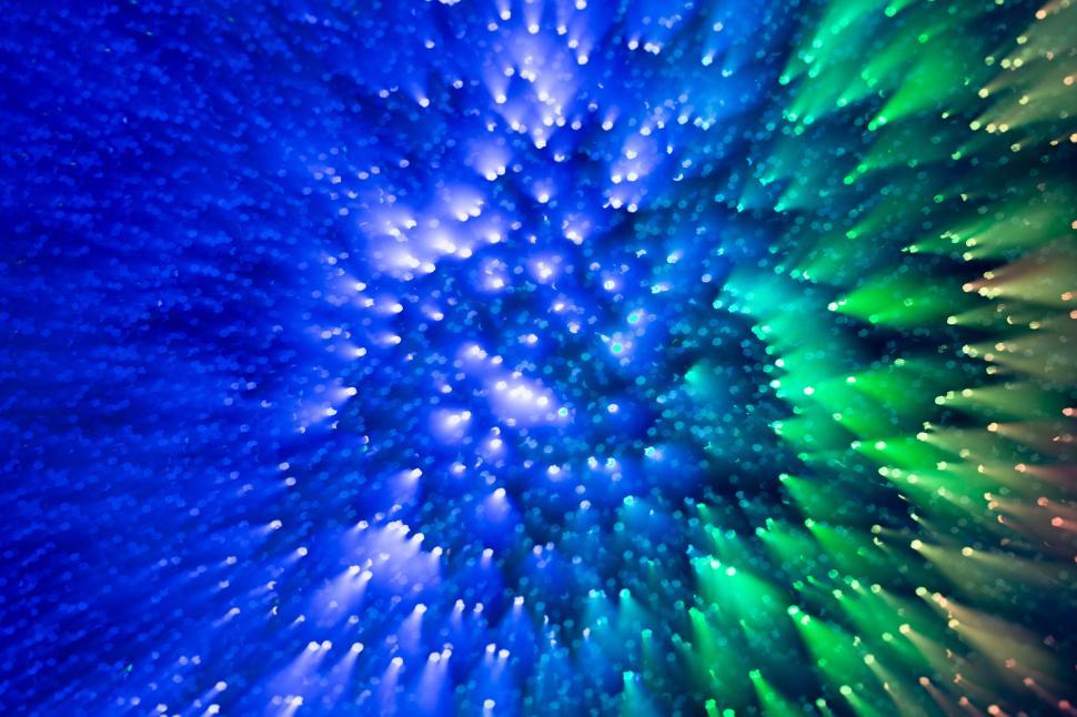 Free Image of Colorful radial light burst creating a visual vortex 