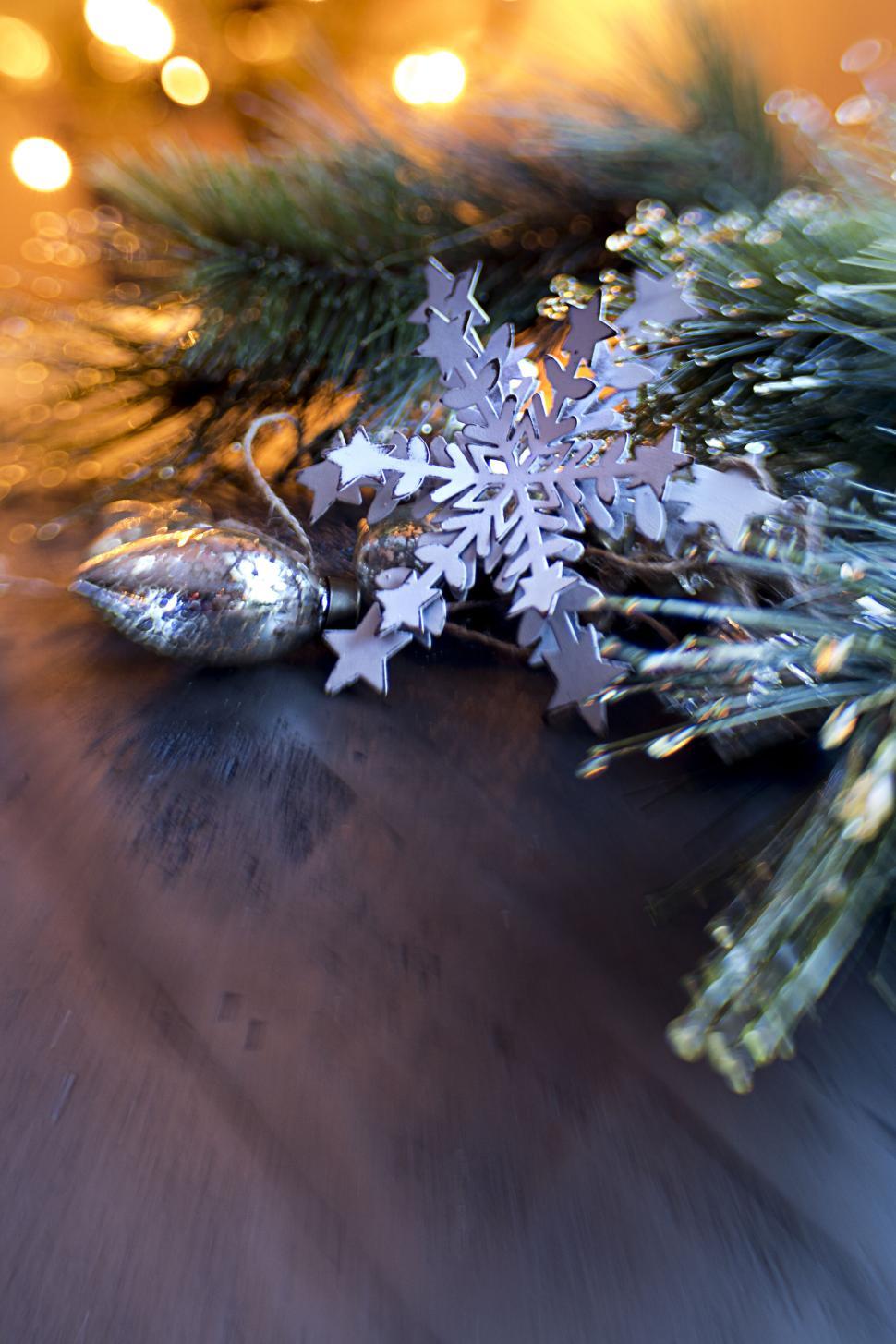 Free Image of Festive Winter Scene with Snowflake Decoration 