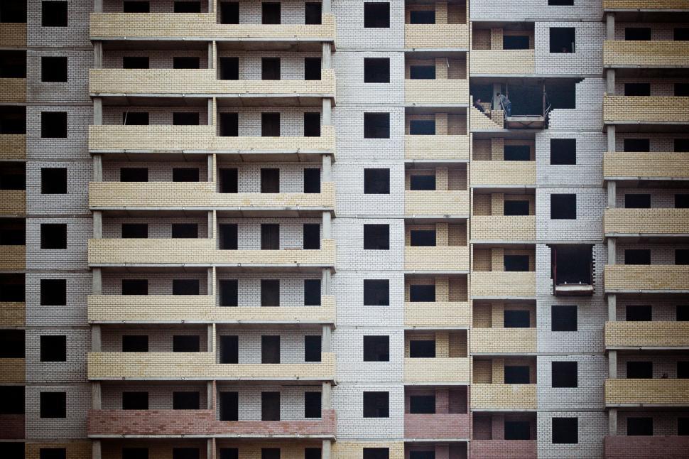 Free Image of Close view of old, abandoned multi-storey building 