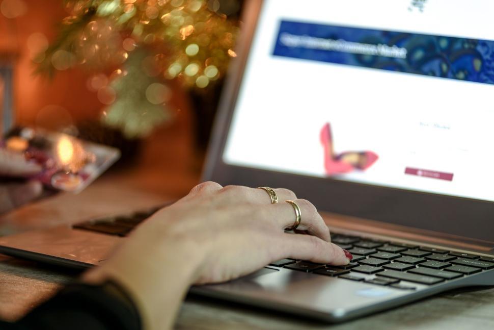 Free Image of Person s hand typing on laptop keyboard with focus 