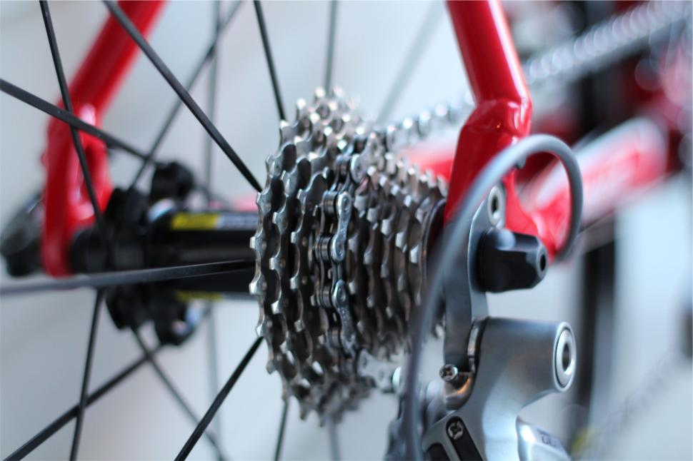 Free Image of Close-up of Bicycle Gear Mechanism with Red Frame. 