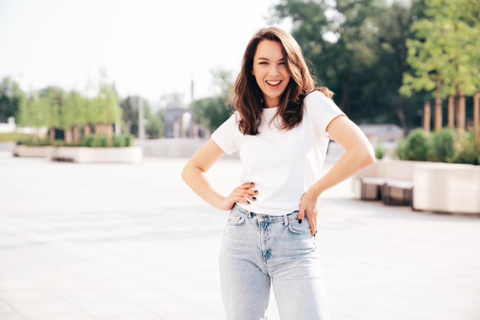 Free Image of Solo young woman poses for outdoor photo 
