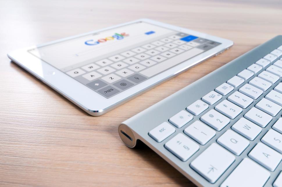 Free Image of Tablet device showing Google search on screen. 