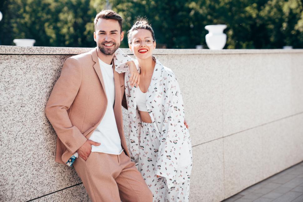 Free Image of Young stylish couple look at camera 
