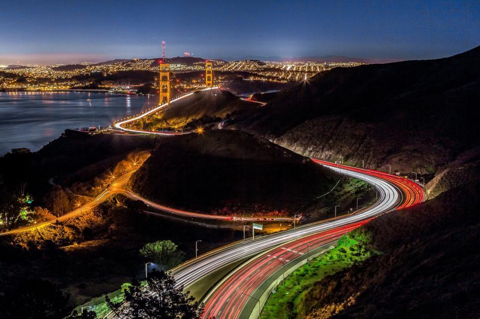Free Image of The Golden Gate Bridge illuminated at night. 