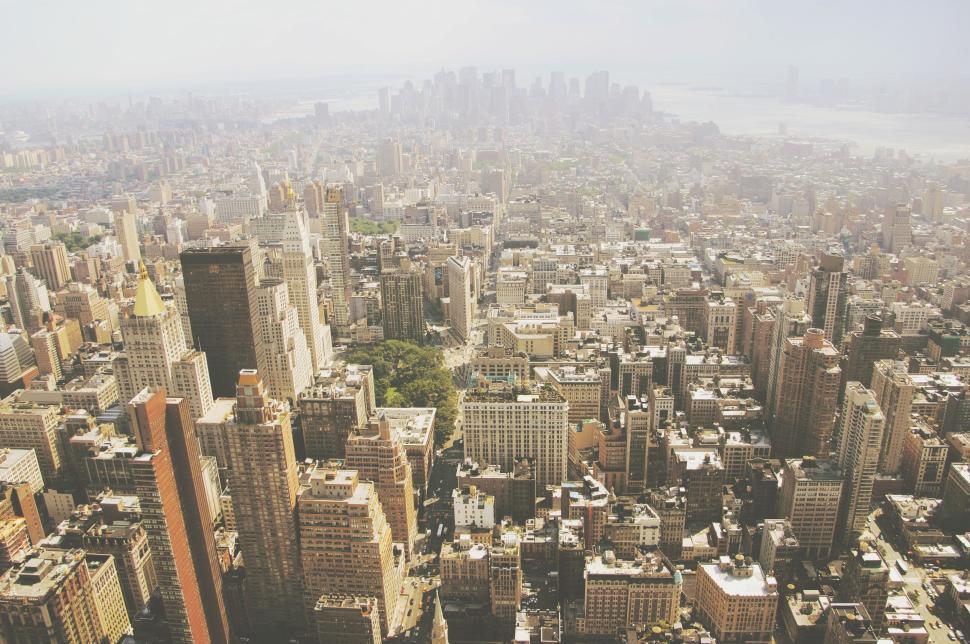Free Image of Aerial view of a busy cityscape with tall buildings 
