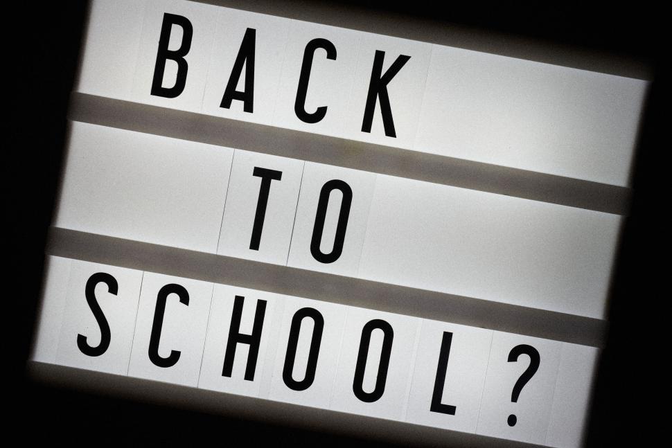 Free Image of Back to School  text in black and white lightbox image. 