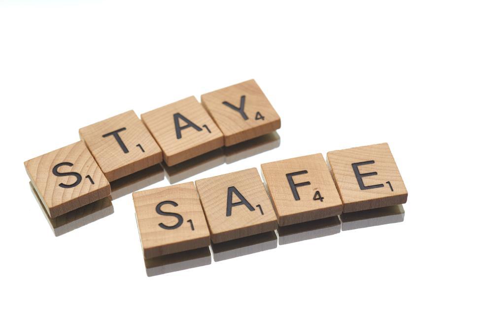 Free Image of Wooden tiles spelling out  STAY SAFE  on white background 