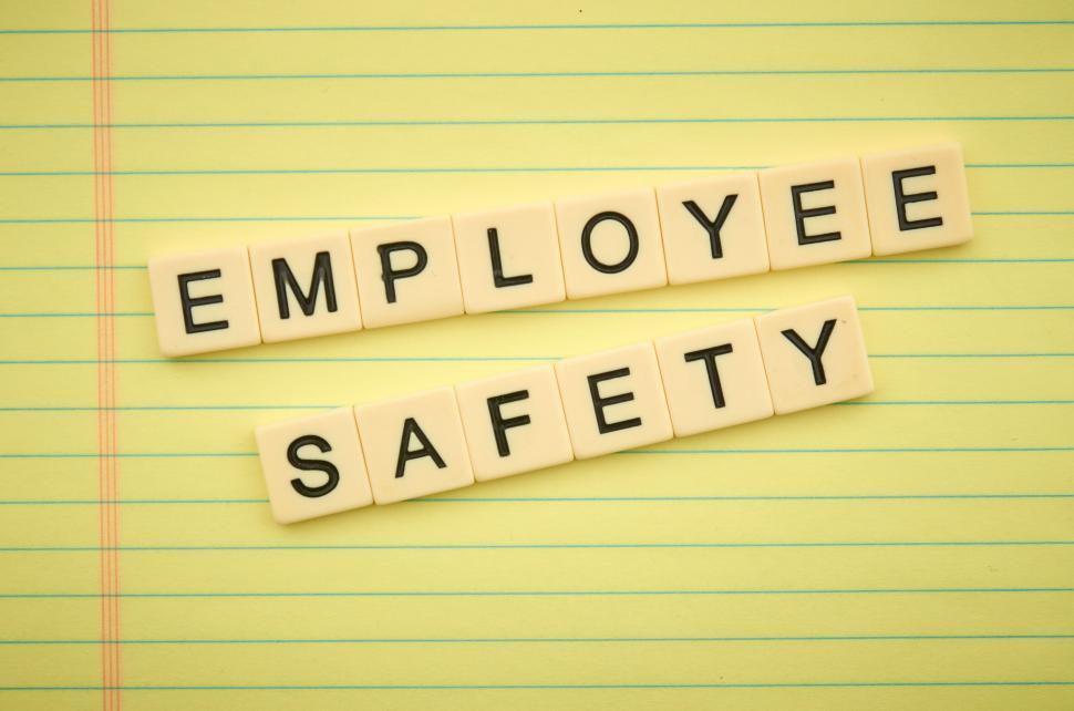 Free Image of Words employee safety spelled out in black text on yellow 