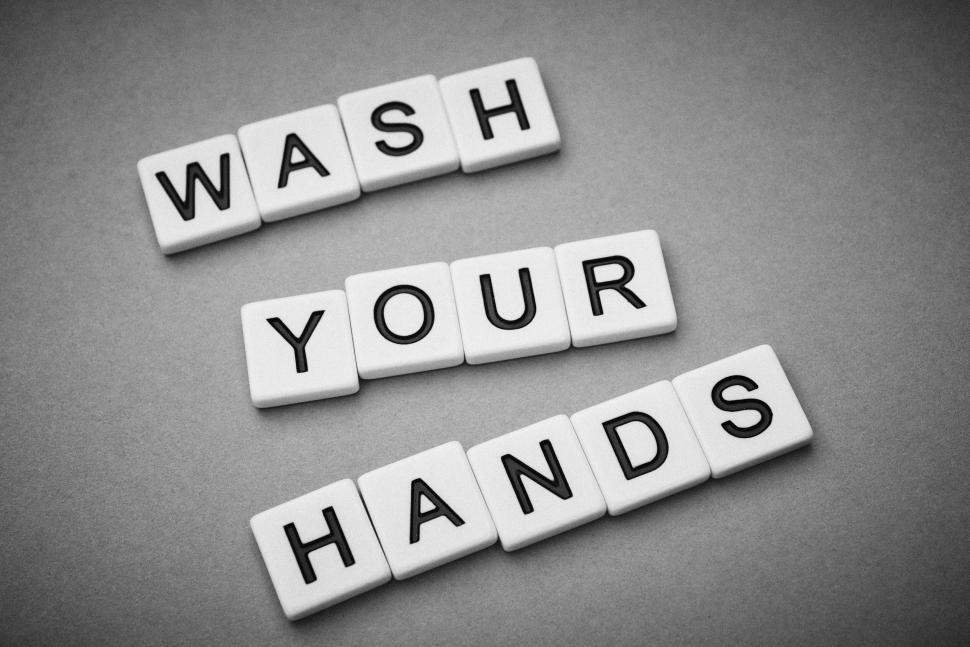 Free Image of Scrabble tiles arranged to spell  wash your hands  in order 