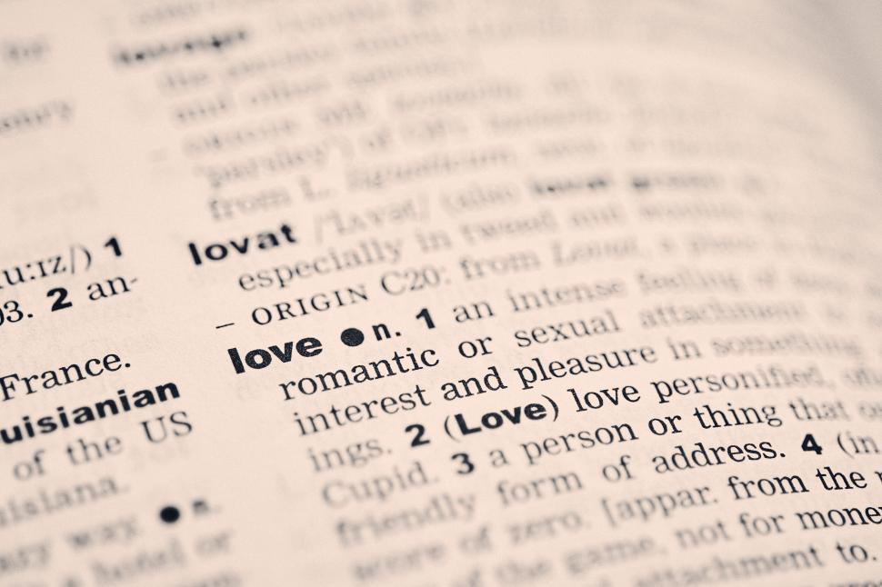 Free Image of Close-up of a dictionary page showing the definition of love. 