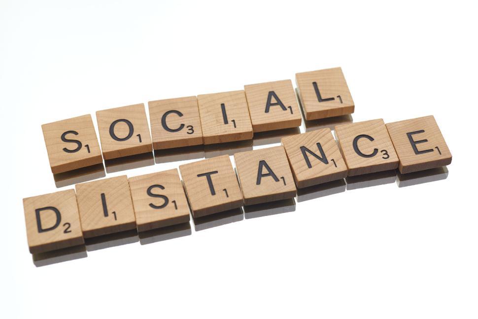 Free Image of Social distance message created from letter tiles display 