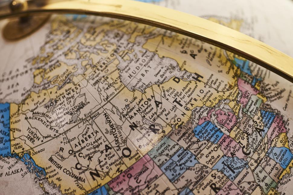 Free Image of Vintage globe highlighting North America and Canada map. 