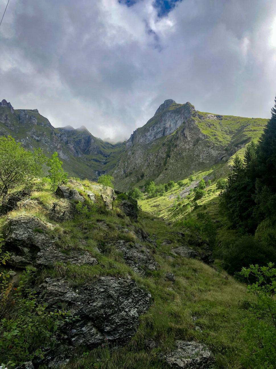 Free Image of Majestic mountain landscape with a touch of sunlight 