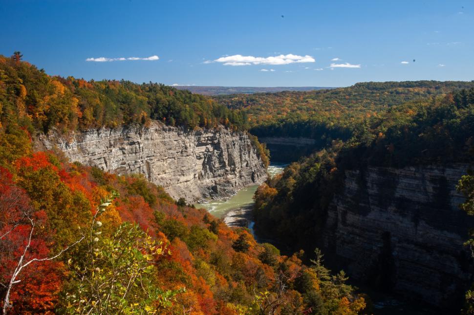 Free Image of Vast canyon landscape with vibrant autumn foliage colors. 