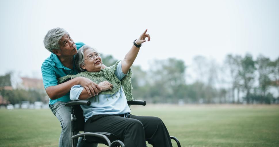 Free Image of Mature asian couple relax with happy in park 