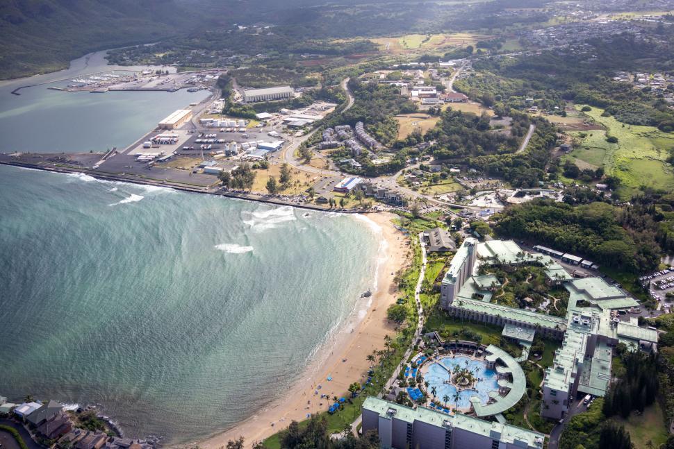 Free Image of Aerial view of coastal resort with sandy beach and ocean 