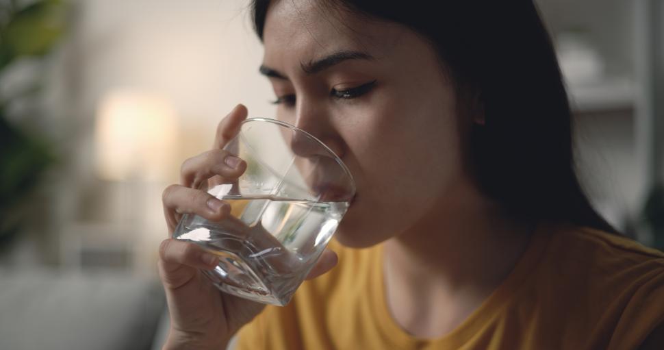 Free Image of Woman drinking water, staying hydrated 