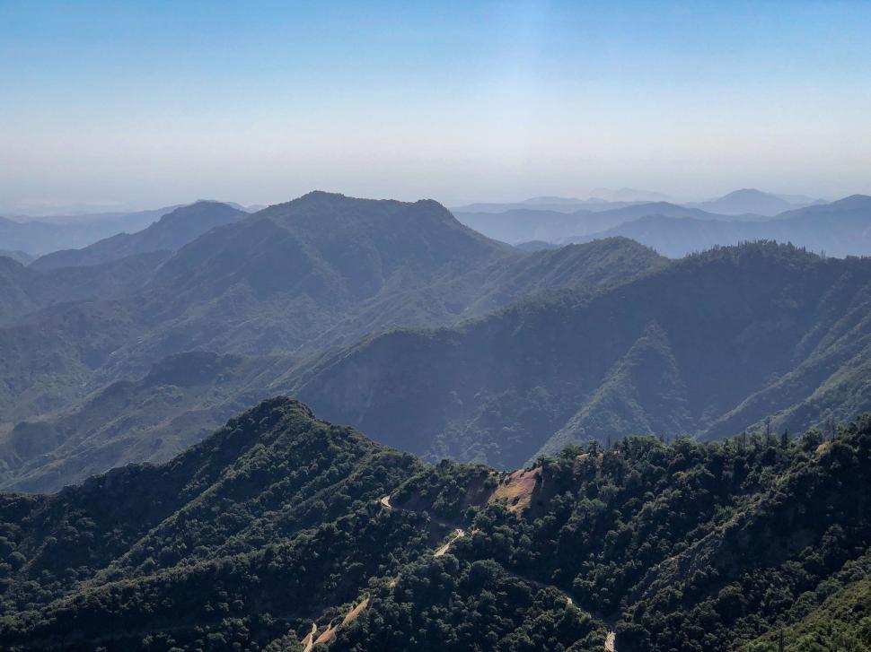 Free Image of Scenic mountain vista under clear blue sky view. 
