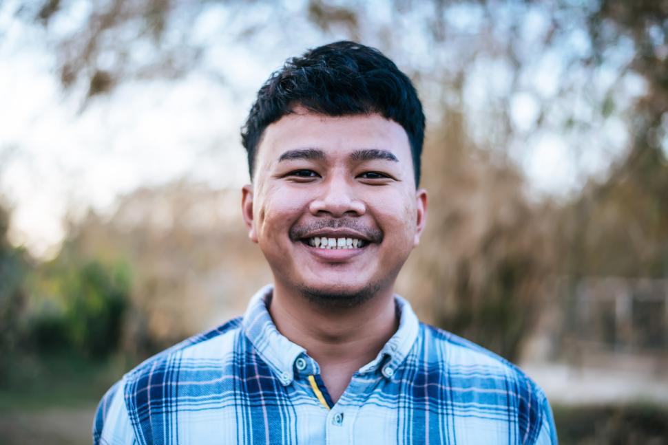 Free Image of Portrait Asian young man smile with happy 